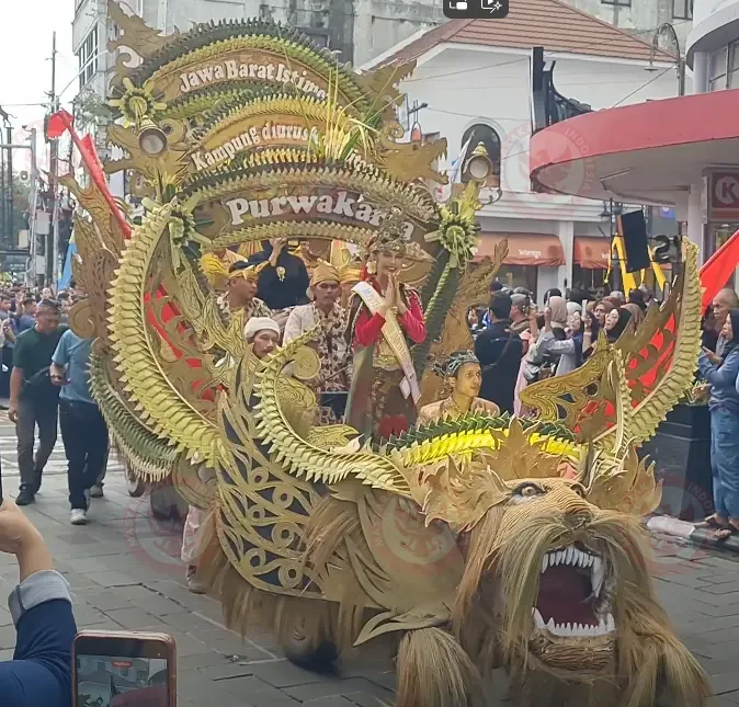Parade participants in traditional Galuh Kingdom costumes