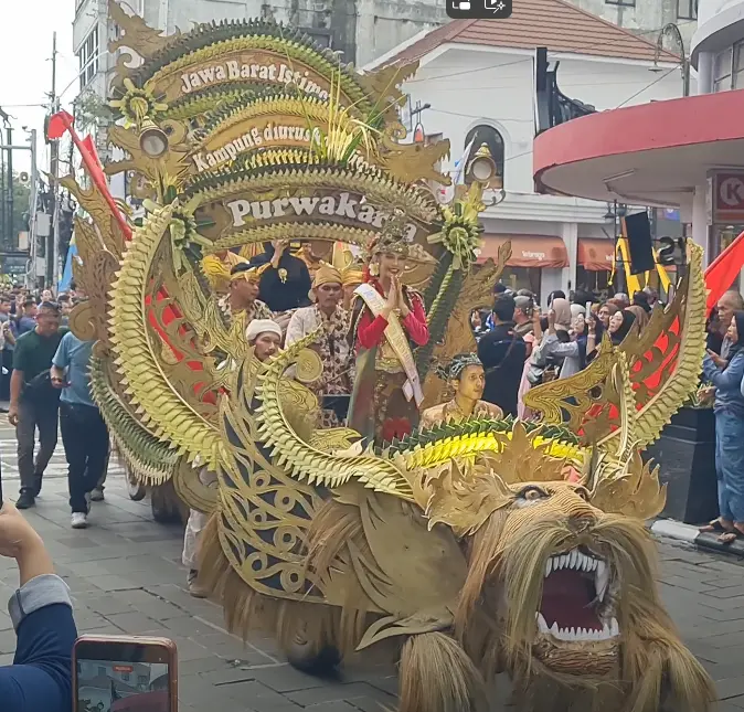 Parade participants in traditional Galuh Kingdom costumes